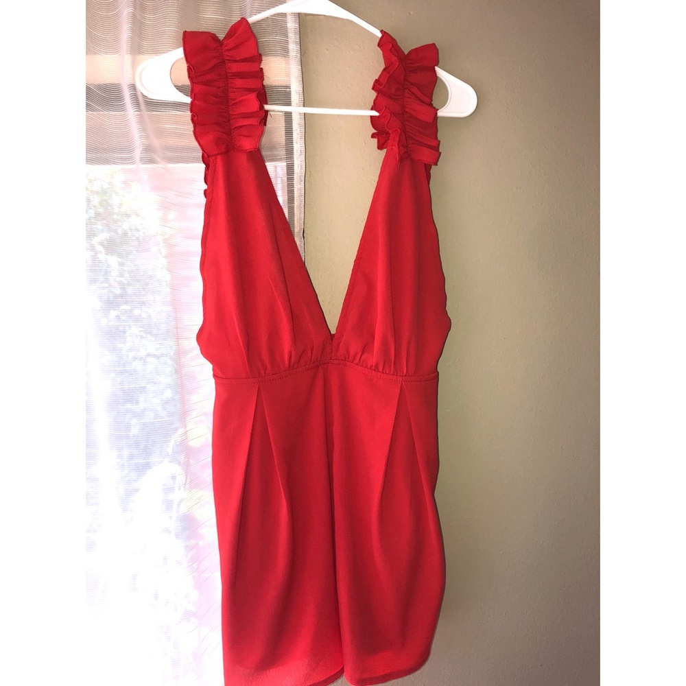 Deep V, open back red romper